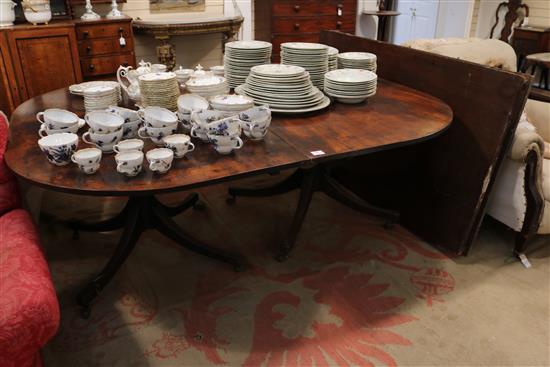 A George III mahogany twin pillar dining table, circa 1800, extends to 12ft 3in. x 5ft 2.5in.